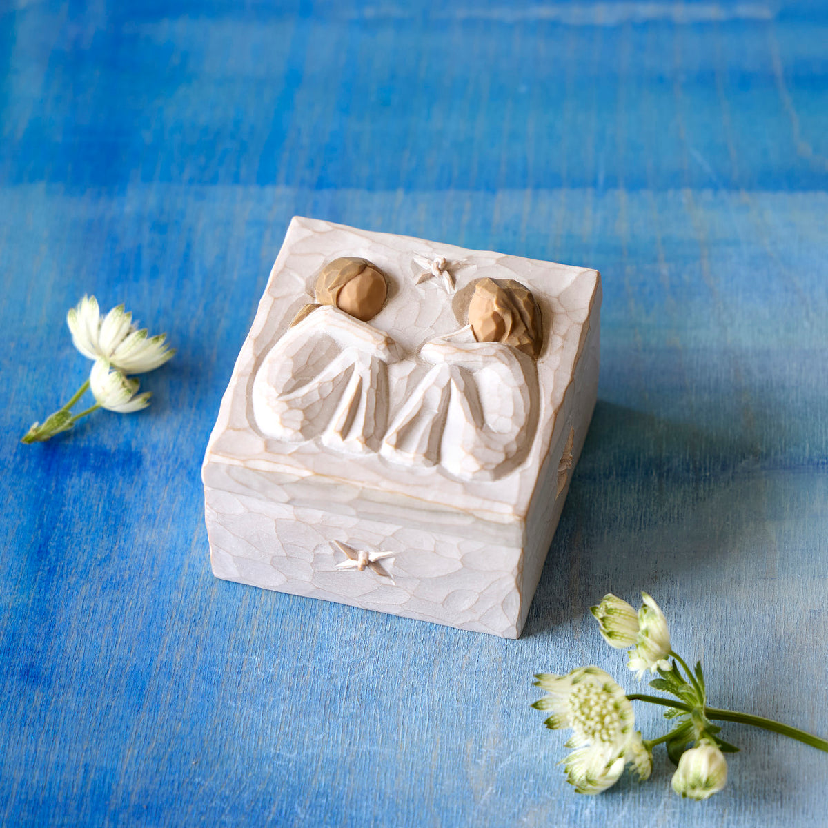 Willow Tree Friendship Keepsake Box, 3”sq x 2”h hand-painted resin box with removable lid. Lid has bas-relief carving of two seated figures in cream dresses, facing each other